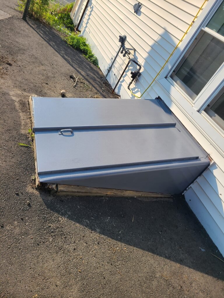 Bulkhead door after refinishing in gray